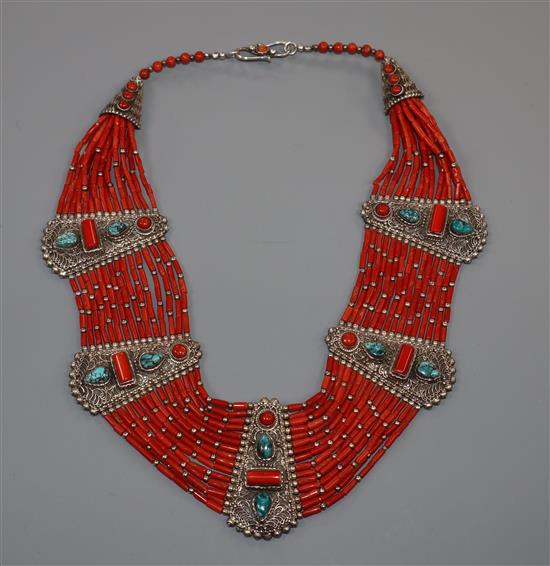 A continental 925 white metal, turquoise and multi strand coral bead necklace, approx. 48cm.
